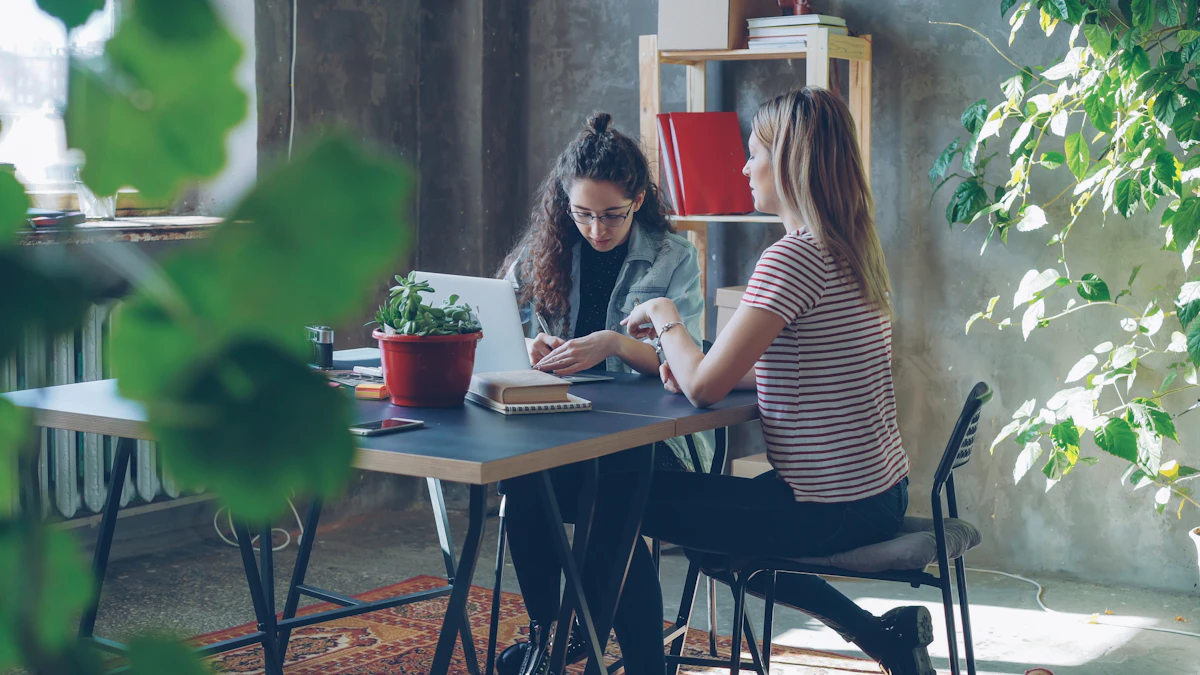 Two people working through an idea together